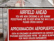 Warning sign at Gibraltar airport runway