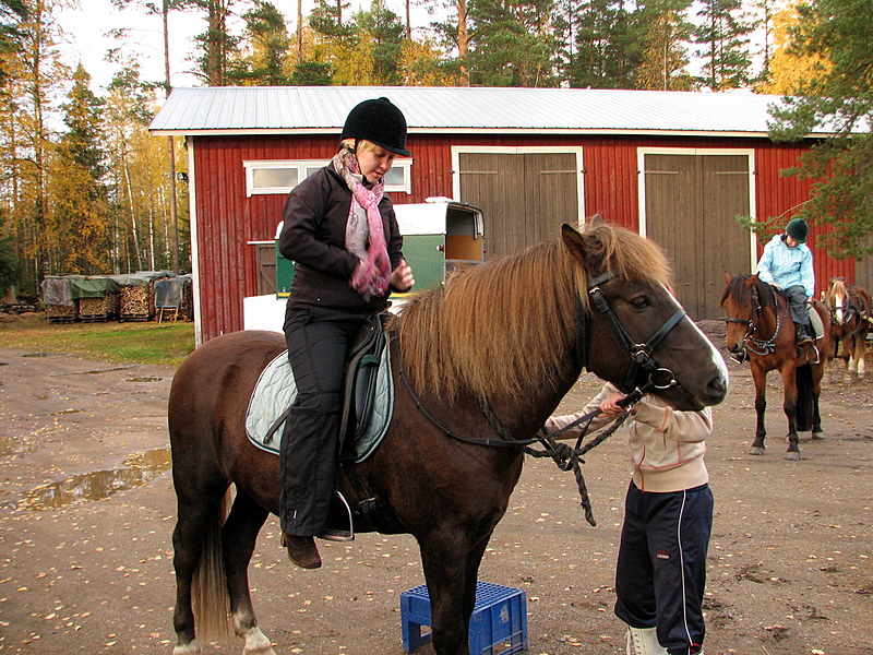 Hanna riding a horse
