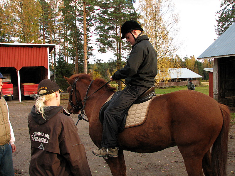Tukki riding a horse